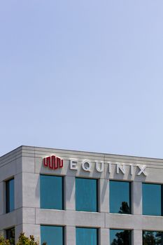 REDWOOD CITY, CA/USA - MAY 31, 2014: Equinix corporate headquarters in Silicon Valley. Equinix provides carrier-neutral data centers and internet exchanges, network-neutral data centers  and interconnection services.
