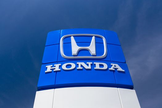 SAN JOSE,CA/USA - MAY 24, 2014:  Honda Autombile Dealership Sign. Honda is a Japanese public multinational corporation and manufacturer of automobiles and motorcycles.