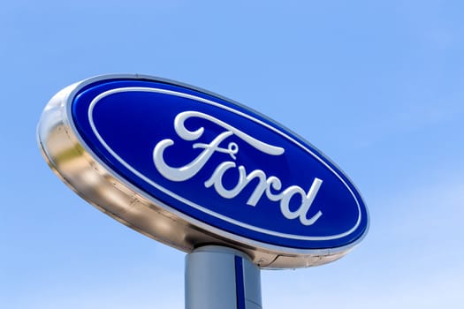 SAN JOSE, CA/USA - MAY 24, 2014: Ford automobile dealership sign. Ford Motor Company is an American multinational automaker headquartered in Dearborn, Michigan.