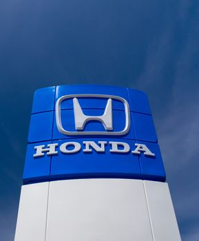 SAN JOSE,CA/USA - MAY 24, 2014:  Honda Autombile Dealership Sign. Honda is a Japanese public multinational corporation and manufacturer of automobiles and motorcycles.