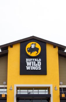 SEASIDE, CA/USA - MAY 8, 2014:  Buffalo Wild Wings restaurant. Buffalo Wild Wings Grill & Bar is a casual dining restaurant and sports bar franchise in the United States and Canada known for its Buffalo wings.