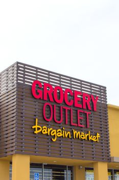SEASIDE, CA/USA - MAY 8, 2014:  Grocery Outlet storefront and sign. Grocery Outlet Inc., is a private, family-owned supermarket franchise chain in the United States.
