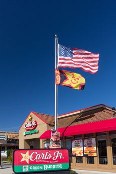 SEASIDE, CA/USA - APRIL 23, 2014:  Carl's Jr. Restaurant exterior. Carl's Jr., an American-based fast-food restaurant chain with locations in the Western and Southwestern states.
