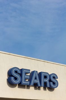 SALINAS, CA/USA - APRIL 8, 2104: Sears exterior sign. Sears is an American department store chain and fourth largest U.S. department store company by retail sales.