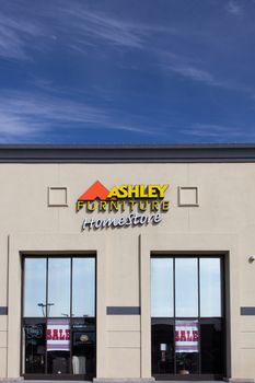 SALINAS, CA/USA - APRIL 8, 2104: Ashley Furniture store exterior. Ashley Furniture is a furniture company that manufactures and distributes home furniture products throughout the world.