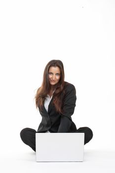 attractive young businesswoman working with laptop computer