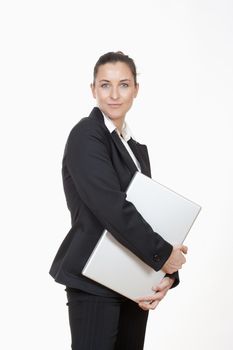attractive businesswoman with laptop computer smiling - clipping path