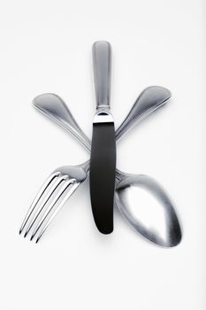 elegant silverware - closeup of fork, knife and spoon