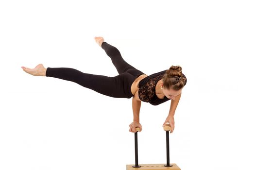 beauty contortionist practicing gymnastic yoga isolated on white background, Young professional gymnast woman