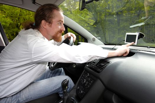 Driver using  GPS navigation a way