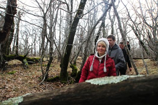 Krasnodar region, Russia - March 23, 2012. Inspection ecologists near the Governor's house Tkachev. Evgenia Chirikova with group of ecologists in the box wood near a cottage of the governor Tkachyov