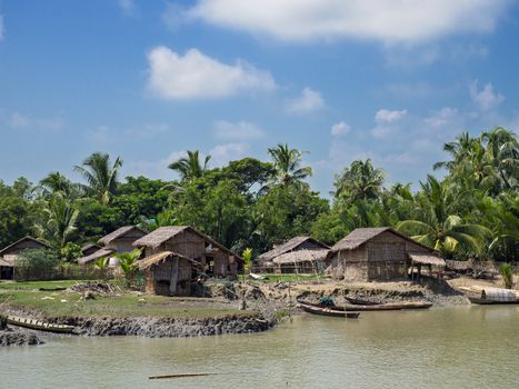 Rural village on the banks of a tributary to the Kaladan River in the northwestern part of Rakhin State, Myanmar