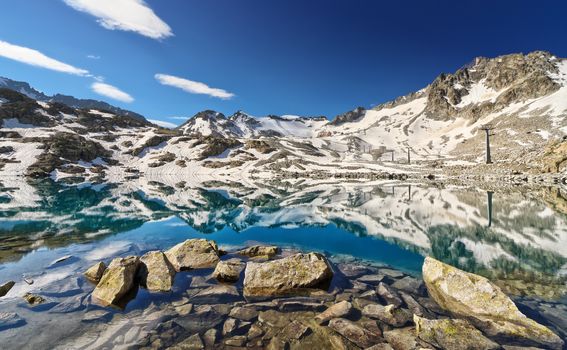 Lago del Monticello with Presena glacier on background, Tonale pass, Italy
