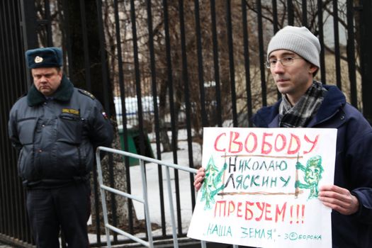 Moscow, Russia - April 10, 2012. Activist Sergey Ageev near prison where there is an arrested politician Nikolay Lyaskin. Liyaskin was detained for attempt to ustnovit protest tent on the Red Square