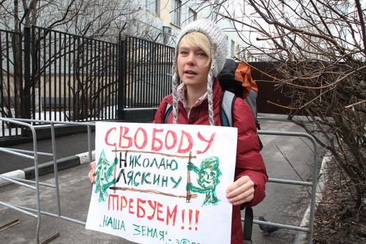 Moscow, Russia - April 10, 2012. The ecologist Evgenia Chirikova on picket near prison where the arrested politician Nikolay Lyaskin contains. Liyaskin was detained for attempt to ustnovit protest tent on the Red Square