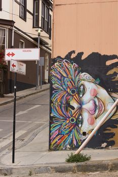 Colourful murals decorating buildings in the coastal city of Valparaiso in Chile. Graffiti is common in Chilean cities such as Valparaiso and is very much part of the culture and heritage of what is now also a UNESCO World Heritage Site.