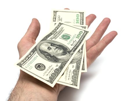 isolated hand with pack of one hundred dollars