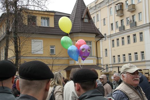 Moscow, Russia - April 19, 2012. The balloons symbolizing the arrested participants of Pussy Riot. . Near the building of the Tagansky court to an unauthorized action there were supporters of the verdict of not guilty for arrested.