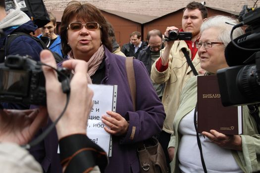 Moscow, Russia - April 19, 2012. The believing Christians came to support participants of Pussy Riot. Near the building of the Khamovniki court to an unauthorized action there were supporters of the verdict of not guilty for arrested