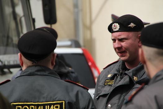 Moscow, Russia - April 19, 2012. Near the building of the Khamovniki court to an unauthorized action there were supporters of the verdict of not guilty for arrested. olice officers near the courthouse where case of Pussy Riot is heard