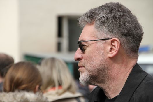 Moscow, Russia - April 19, 2012. The musical critic Artemy Troitsky came to support the arrested participants of Pussy Riot to court. Near the building of the Tagansky court to an unauthorized action there were supporters of the verdict of not guilty for arrested.