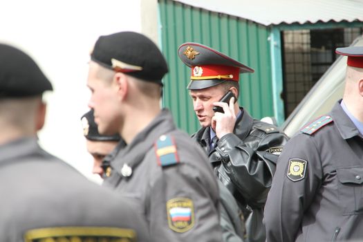 Moscow, Russia - April 19, 2012. Near the building of the Khamovniki court to an unauthorized action there were supporters of the verdict of not guilty for arrested. olice officers near the courthouse where case of Pussy Riot is heard