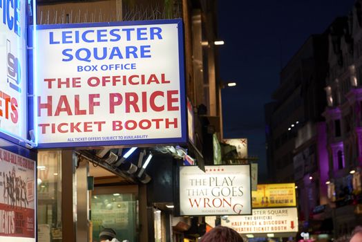 LONDON, UK - JANUARY 02: Detail of half price theatre ticket booths neon banners in Leicester Square. January 02, 2015 in London.