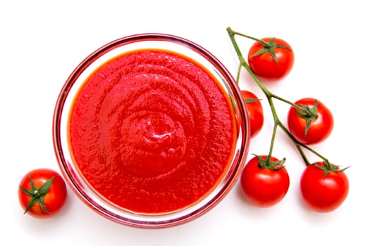 Tomato sauce on a white background seen from above