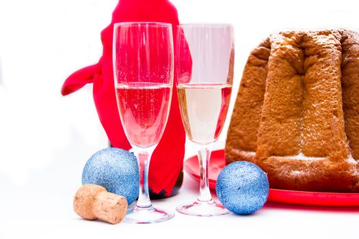 Champagne and Christmas decorations on white background
