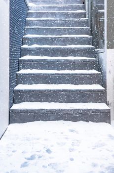 Old stall close texture round stair with snow and flying snow.