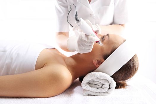 Rejuvenation, beautification, the woman at the beautician, Mesotherapy microneedle