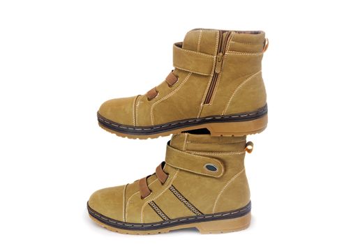 Comfortable and warm winter suede boots for women. Presented on a white background.