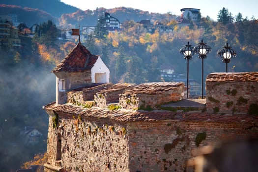 Brasov, Romania - November 7, 2012: Detail of old fortress "Cetatuia" on a sunny autumn day, Brasov, Romania