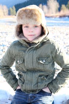 Young boy outside on a cold winters day