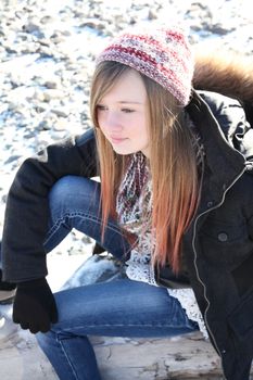 Teen girl outside on a cold winters day