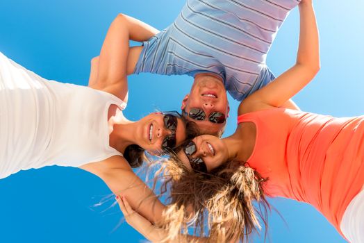 shooting a group of young people from low angle