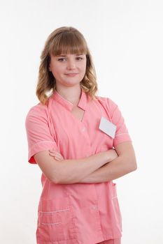 Portrait of a pretty girl medical worker on a white background