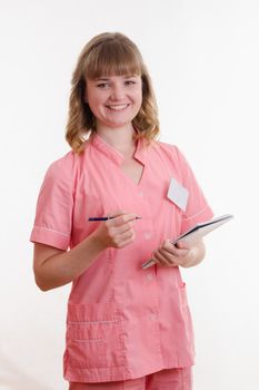 Portrait of a pretty girl medical worker on a white background