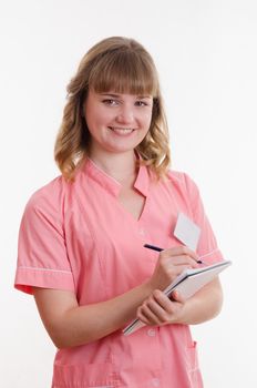 Portrait of a pretty girl medical worker on a white background