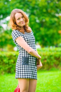 portrait of a shy girl with red hair