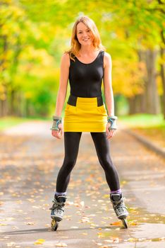 Happy active girl plays sports in the park