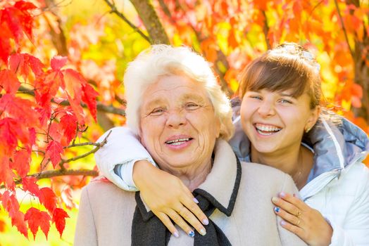 Happy portrait of grandmother and granddaughter