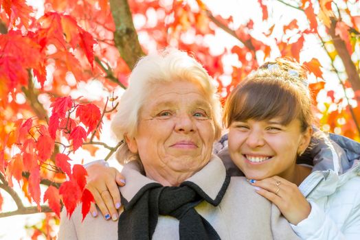 portrait of a happy family in autumn park