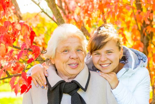 cheerful and happy girl and her grandmother