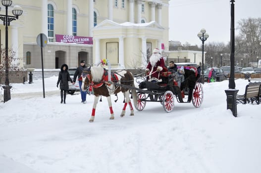 Festive drivings in the carriage with Father Frost