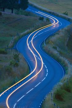 view of traffic on curvy winding road in southern sweden