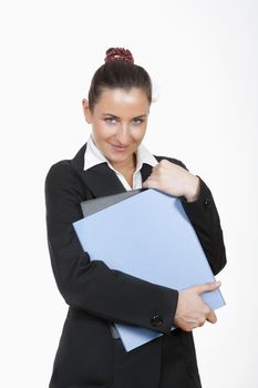 young beautiful businesswoman in suit standing holding files
