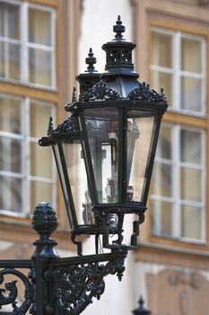 antique gas lamps at the old town square, prague, czech republic