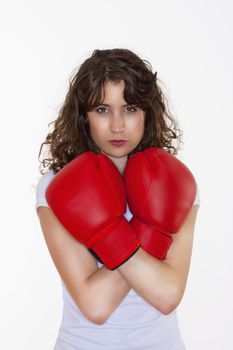 young brunette woman with red boxing gloves