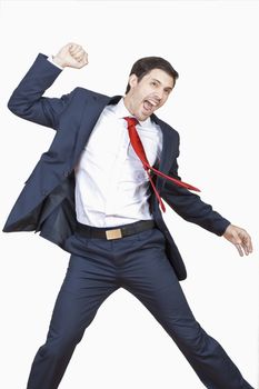 young business executive in suit cheering jumping in the air isolated on white